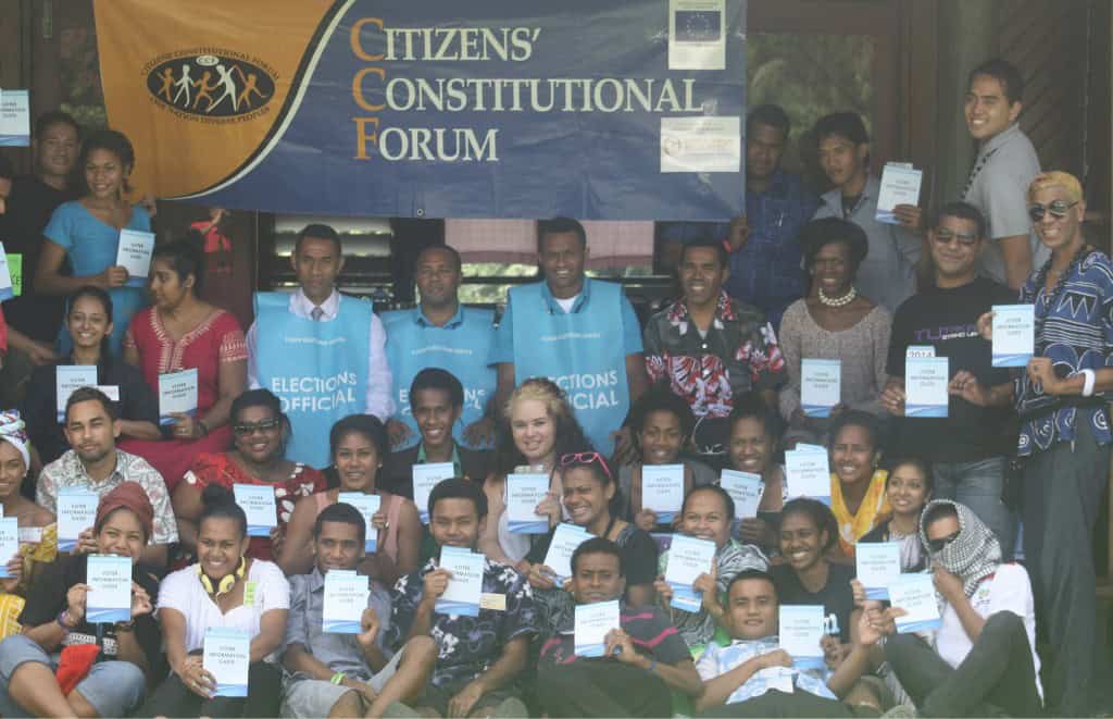 National Youth Forum participants with their voter information guide pose for a picture with the officials from the Fiji Elections Office: Picture by: Nazeem Kasim. 