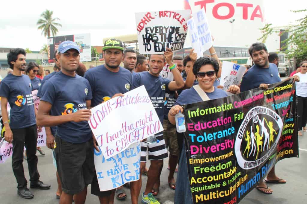CCF staff and volunteers march during the Human Rights Day along the Suva corridor. 