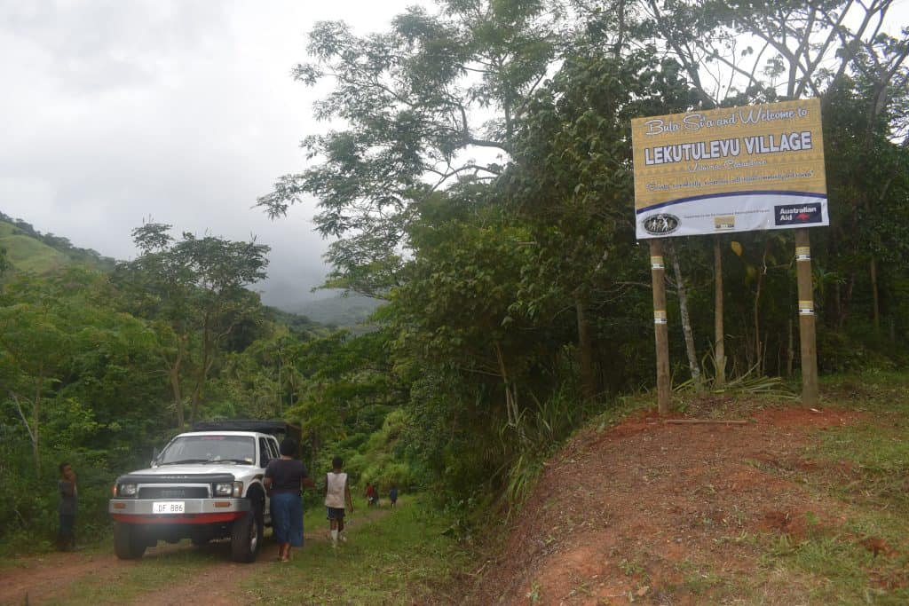 The new Lekutulevu Village board at the entry of the village.